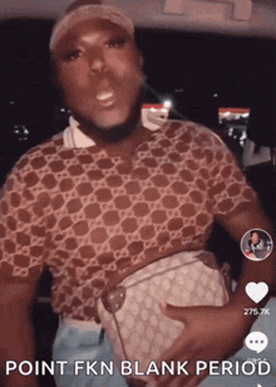 Man In Gucci Shirt Holding Purse GIF