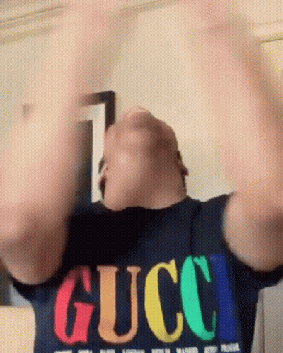 Man In Gucci T-Shirt Arms In Air GIF