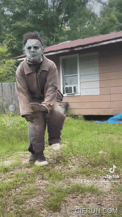 Man In Halloween Costume In Front Of House GIF