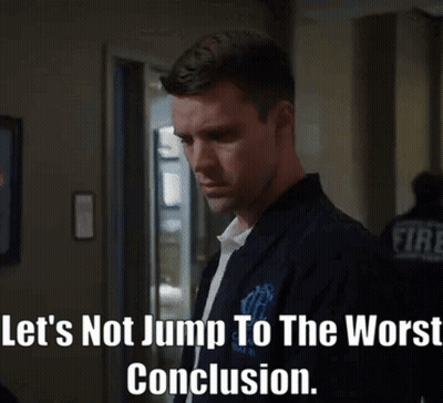 Man In Hallway Saying Let's Not Jump To The Worst Conclusion GIF