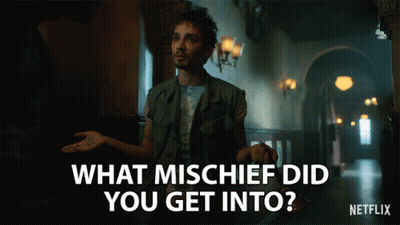 Man In Hallway Saying What Mischief Did You Get Into GIF