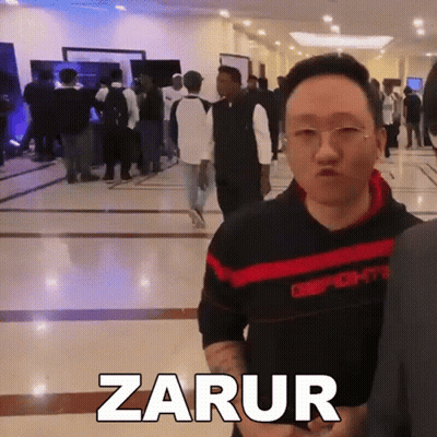 Man In Hallway With Zarur On Floor GIF