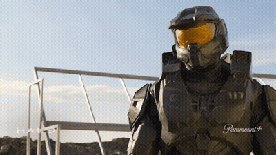 Man In Halo Costume In Front Of Paramount Sign GIF