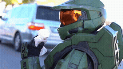 Man In Halo Helmet Holding Paper GIF
