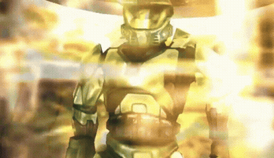 Man In Halo Helmet Standing In Front Of Yellow Light GIF