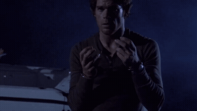 Man In Handcuffs Standing By Car GIF