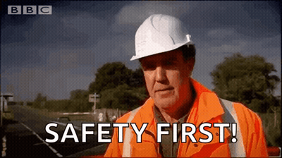 Man In Hard Hat And Orange Jacket On BBC Channel GIF