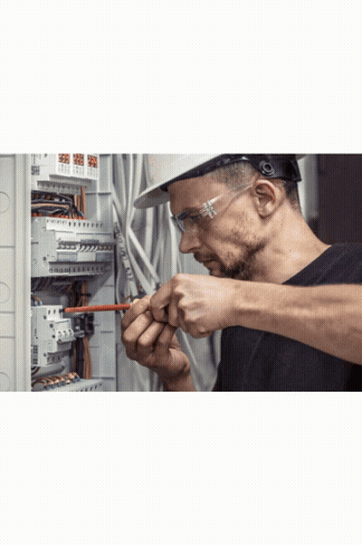 Man In Hard Hat And Safety Glasses Working On Circuit Board GIF