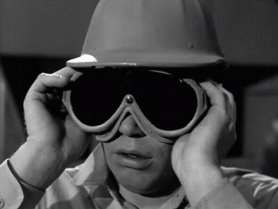 Man In Hard Hat Covering Ears GIF