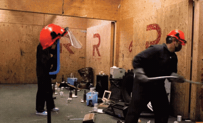 Man In Hard Hat In Front Of Wall With R And G GIF