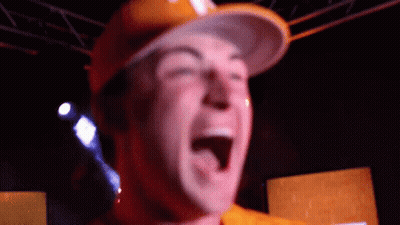 Man In Hard Hat Laughing With Mouth Open GIF
