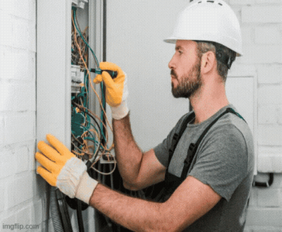 Man In Hard Hat Working On Electrical Box GIF