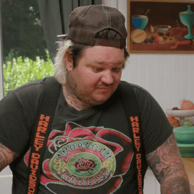 Man In Harley Davidson T-Shirt And Suspenders GIF