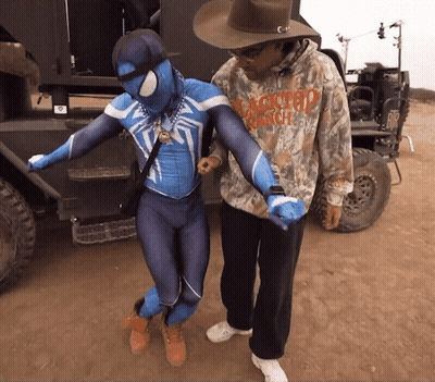 Man In Hat And Apocalypse Army Hoodie GIF
