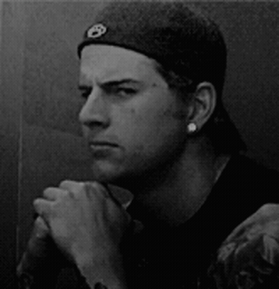 Man In Hat And Black Shirt Giving Middle Finger GIF