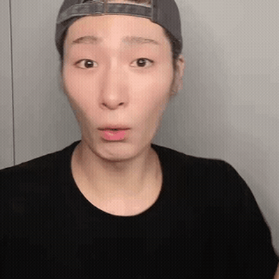 Man In Hat And Black Shirt Making Funny Face GIF