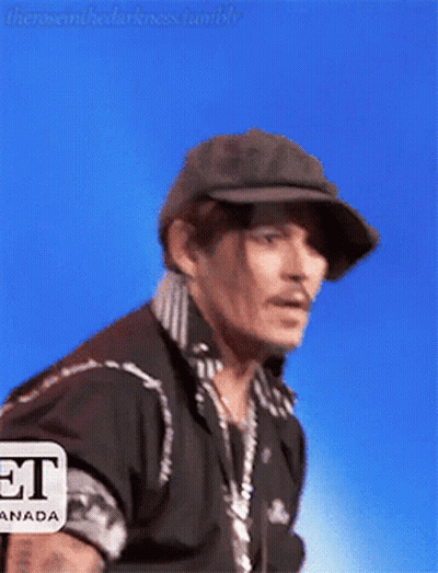 Man In Hat And Black Shirt Saying Et GIF