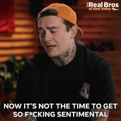 Man In Hat And Black Shirt Saying Not The Time To Get Sentimental GIF