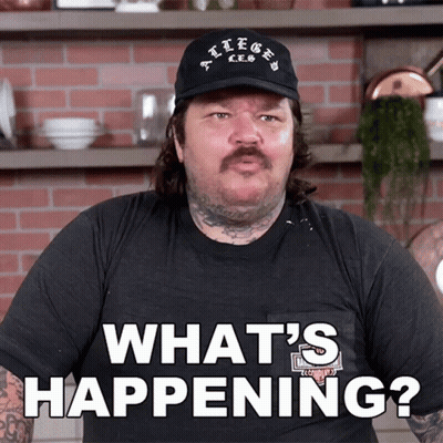 Man In Hat And Black Shirt Says What's Happening GIF