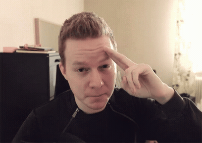 Man In Hat And Black Shirt Sitting By Nike Box GIF