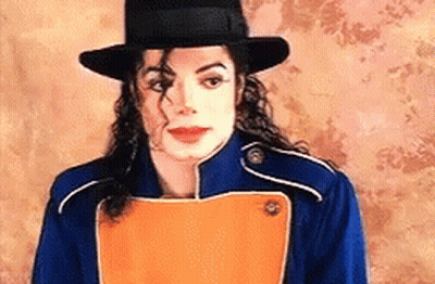 Man In Hat And Blue Jacket Holding Orange Paper GIF