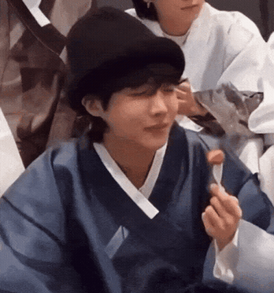 Man In Hat And Blue Kimono Eating With Spoon GIF