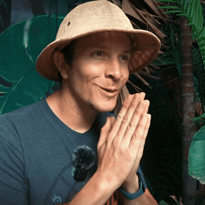 Man In Hat And Blue Shirt Hands Folded GIF