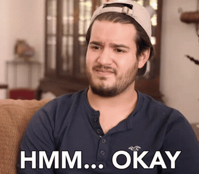 Man In Hat And Blue Shirt Saying Hmm Okay GIF
