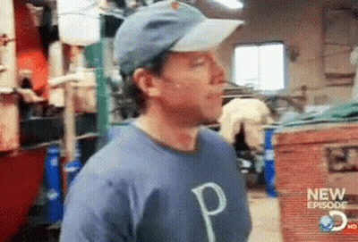 Man In Hat And Blue Shirt Saying P GIF