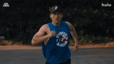 Man In Hat And Blue Tank Top Running With Chad Powers GIF