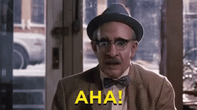 Man In Hat And Bow Tie Says Aha GIF