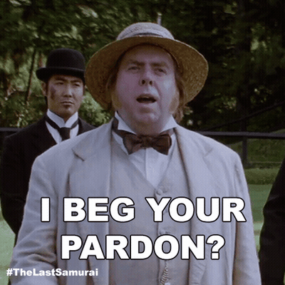 Man in Hat and Bow Tie Says I Beg Your Pardon