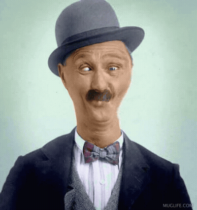 Man In Hat And Bow Tie With Muglife.com GIF
