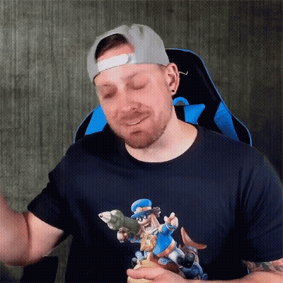 Man In Hat And Cartoon T-Shirt GIF