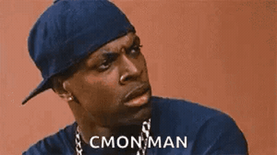 Man In Hat And Chain Making Funny Face Saying Cmon Man GIF