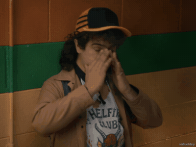 Man In Hat And Club Shirt Covering Face GIF