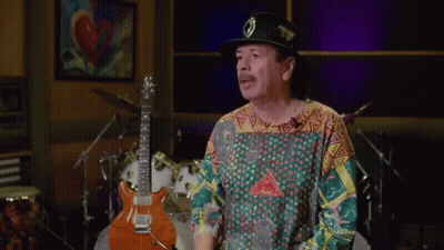 Man In Hat And Colorful Shirt With Guitar GIF