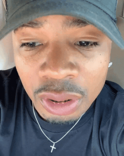 Man In Hat And Cross Necklace GIF