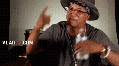 Man In Hat And Glasses Holding Water Bottle GIF
