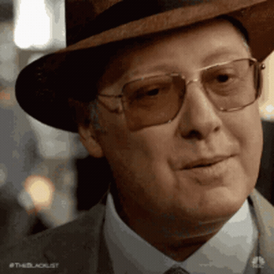 Man In Hat And Glasses Smiling At Camera GIF