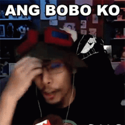 Man In Hat And Headphones Making Funny Face On Video Call GIF