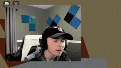 Man In Hat And Headphones On Evoxx Chair GIF