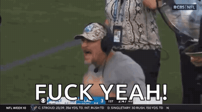 Man In Hat And Headphones Saying Fuck Yeah On Football Field GIF