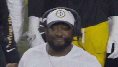 Man In Hat And Headphones Sitting In Stands GIF