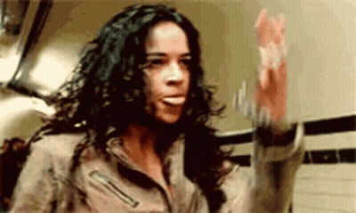Man In Hat And Hoodie Next To Woman GIF