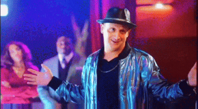 Man In Hat And Jacket Dancing In Club GIF