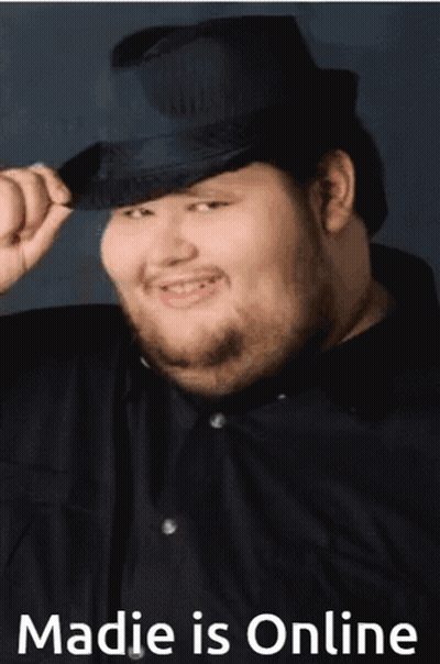 Man In Hat And Jacket Dancing In Club GIF