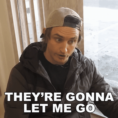 Man In Hat And Jacket Saying They're Gonna Let Me Go GIF