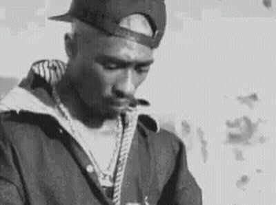 Man In Hat And Jacket Smoking Cigarette Black And White GIF