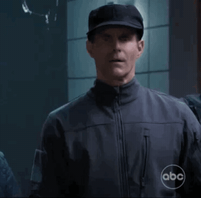 Man In Hat And Jacket With ABC Logo GIF